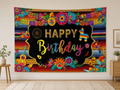 Mexican Fiesta Happy Birthday Backdrop displayed on a home wall