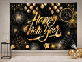 Black and gold Happy New Year backdrop home party scene