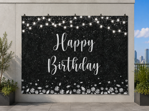 Black and Silver Sparkle Happy Birthday Backdrop — temporary dry outdoor wall-clip display; accessories not included