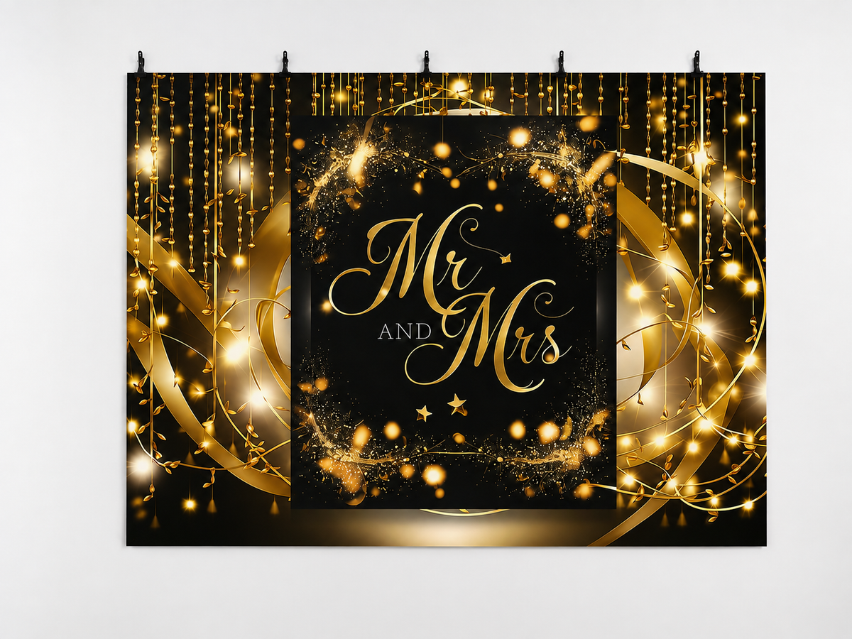 Black and Gold Mr and Mrs printed polyester backdrop, shown at244 x183cm with straight-cut unhemmed edges and wall clips. Flat printed scenery; accessories not included.