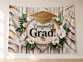 White and Gold Congrats Grad Backdrop shown as a hanging polyester backdrop