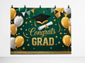 Congrats Grad Green and Gold printed polyester backdrop, shown at244 x183cm with straight-cut unhemmed edges and wall clips. Flat printed scenery; accessories not included.