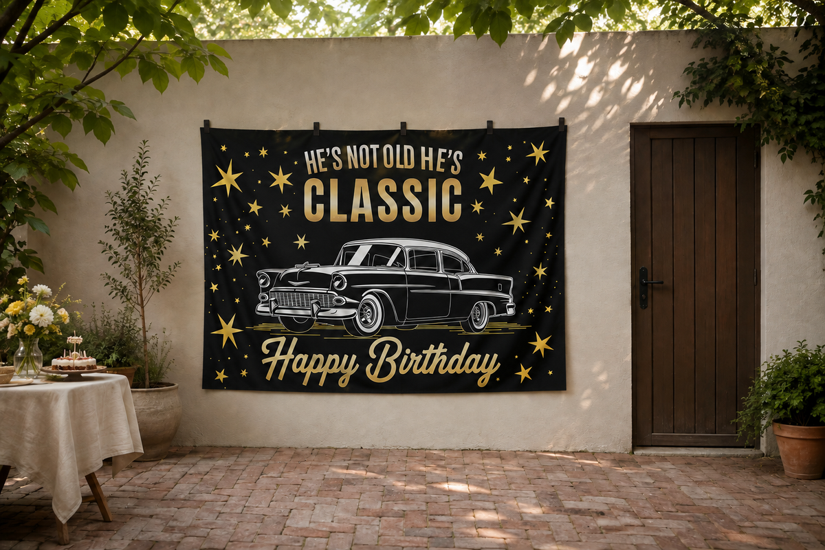Classic car birthday polyester backdrop clipped to an outdoor courtyard wall; display accessories not included